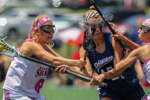 Female lacrosse players  from Skywalkers and South Jersey Select showcasing in front of college coaches at the Nike Elite G8 Girls Lacrosse Club tournament (2015) as part of the early recruiting process for women's lacrosse.