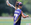 Yellow jackets left handed female lacrosse player in purple jersey with headband showcases for college coaches - early recruiting. © Equity IX - SportsOgram - Leigh Ernst Friestedt